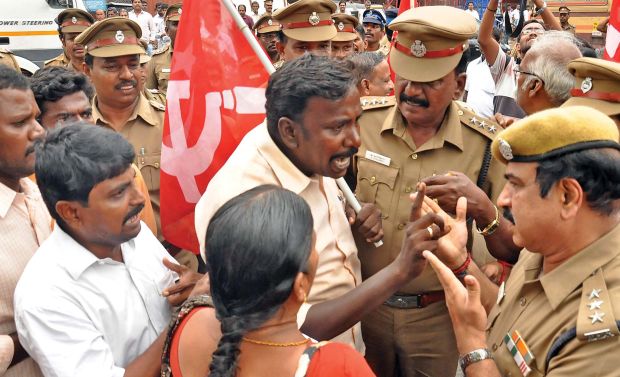 CPI(M) cadres enter into an argument with police while protesting against the state election commission alleging rigging by AIADMK functionaries during the local body byelections in Chennai on Thursday. (Photo: DC) CPI(M) cadres enter into an argument with police while protesting against the state election commission alleging rigging by AIADMK functionaries during the local body byelections in Chennai on Thursday. (Photo: DC)
